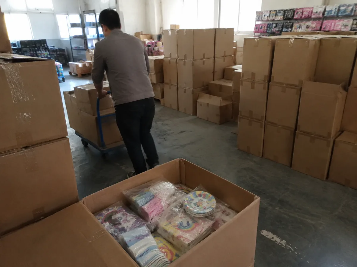 packed and labeled party supply cartons in the export packaging warehouse